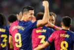 Robert Lewandowski celebrates after scoring during Barcelona's 5-1 thrashing of Sevilla.